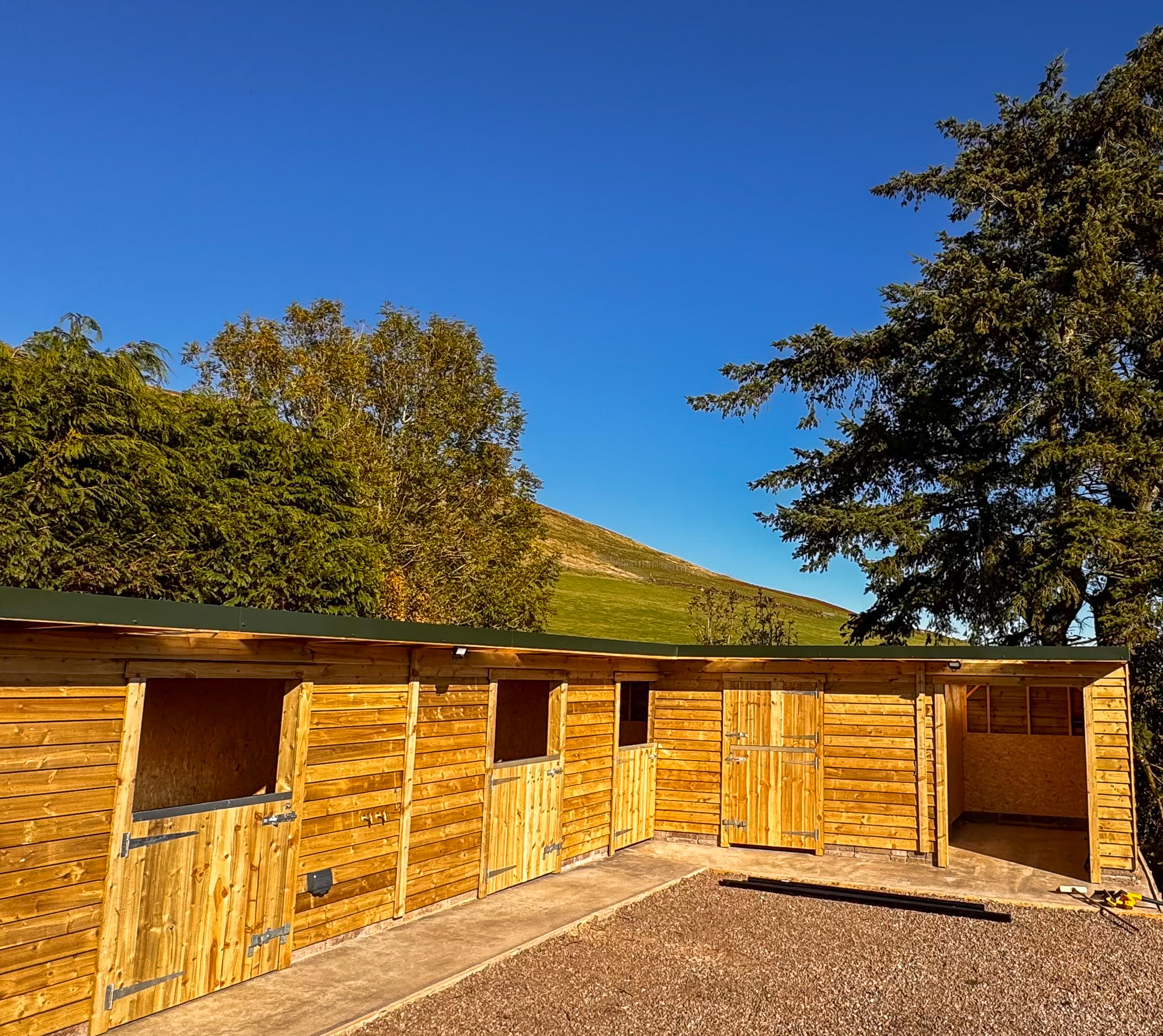 K. Lewis Joinery - Custom Equestrian Stables with Scottish Landscape